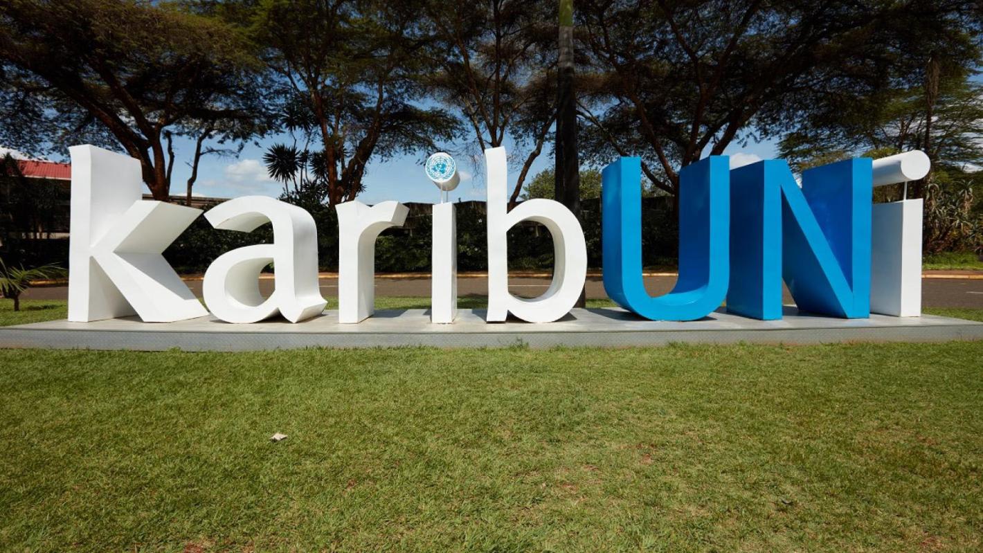 Welcome sign “KaribUNi” at the main roundabout of the ONUN complex in Nairobi