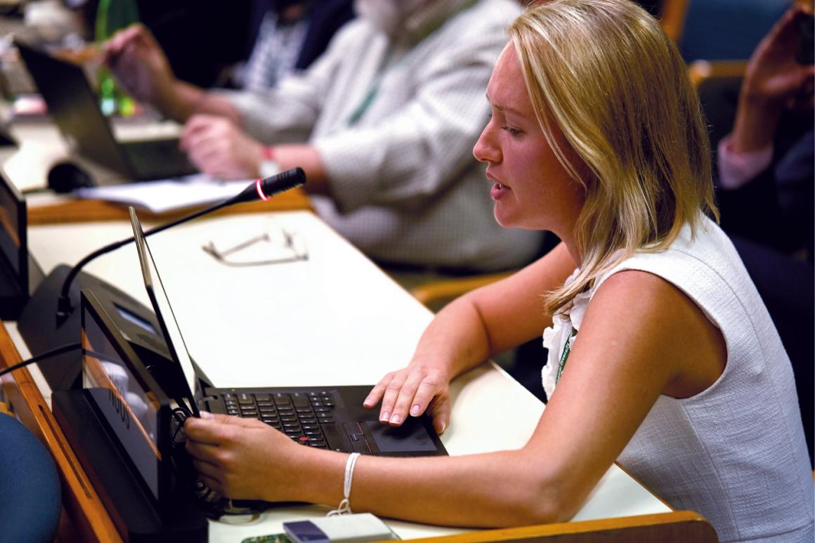 A representative Delegate presenting her speech at a conference at United Nations Office at Nairobi complex